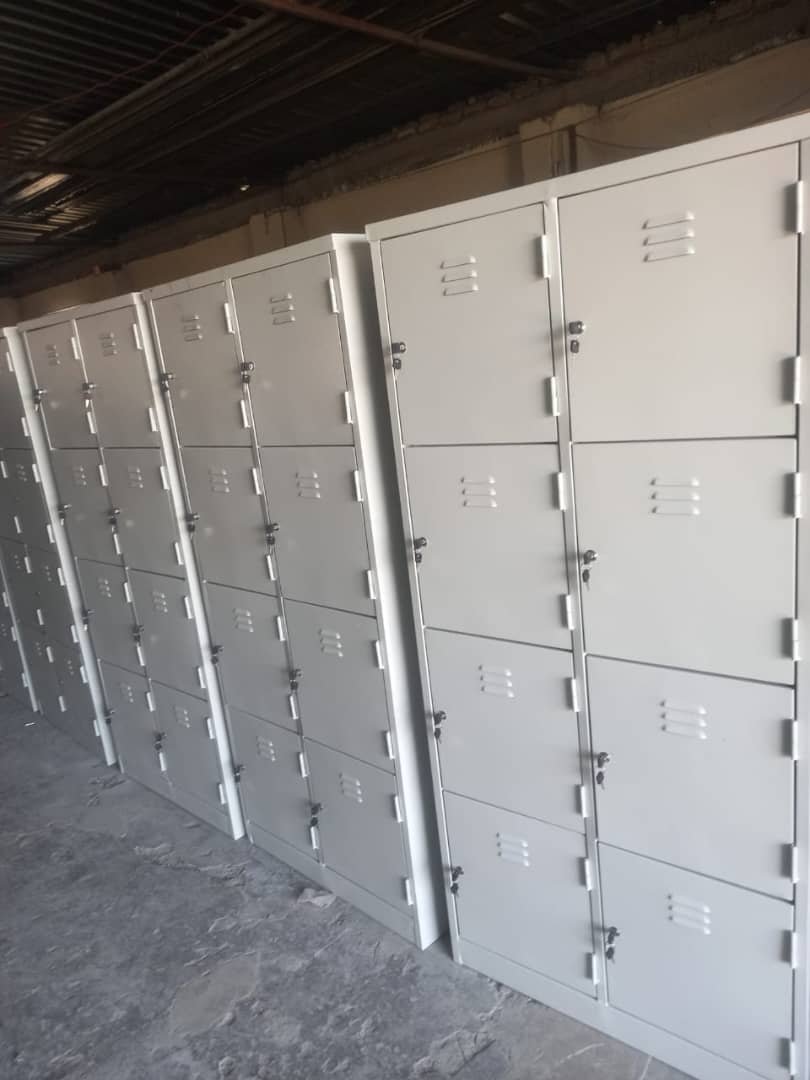 Rows of steel lockers delivered — bulk institutional supply by Izibulo